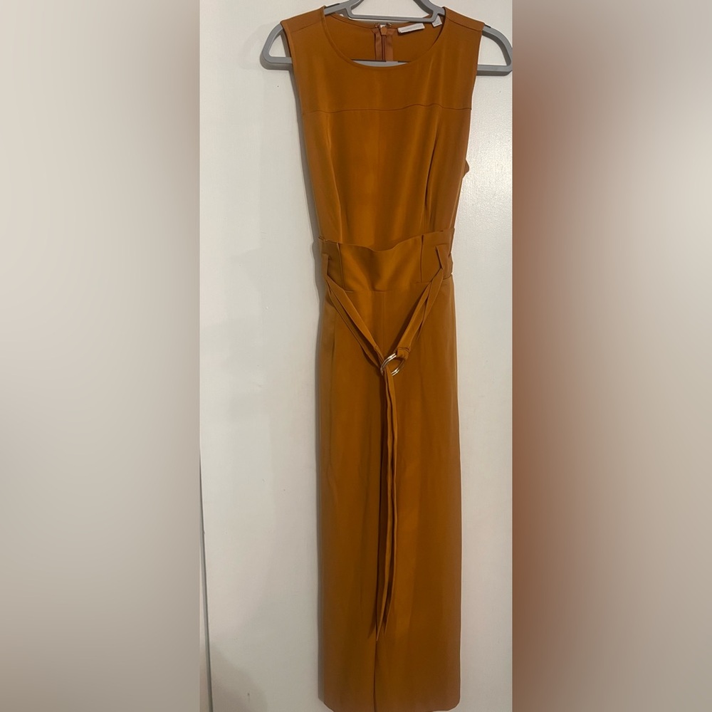 One piece gold colored jumpsuit zipper back .